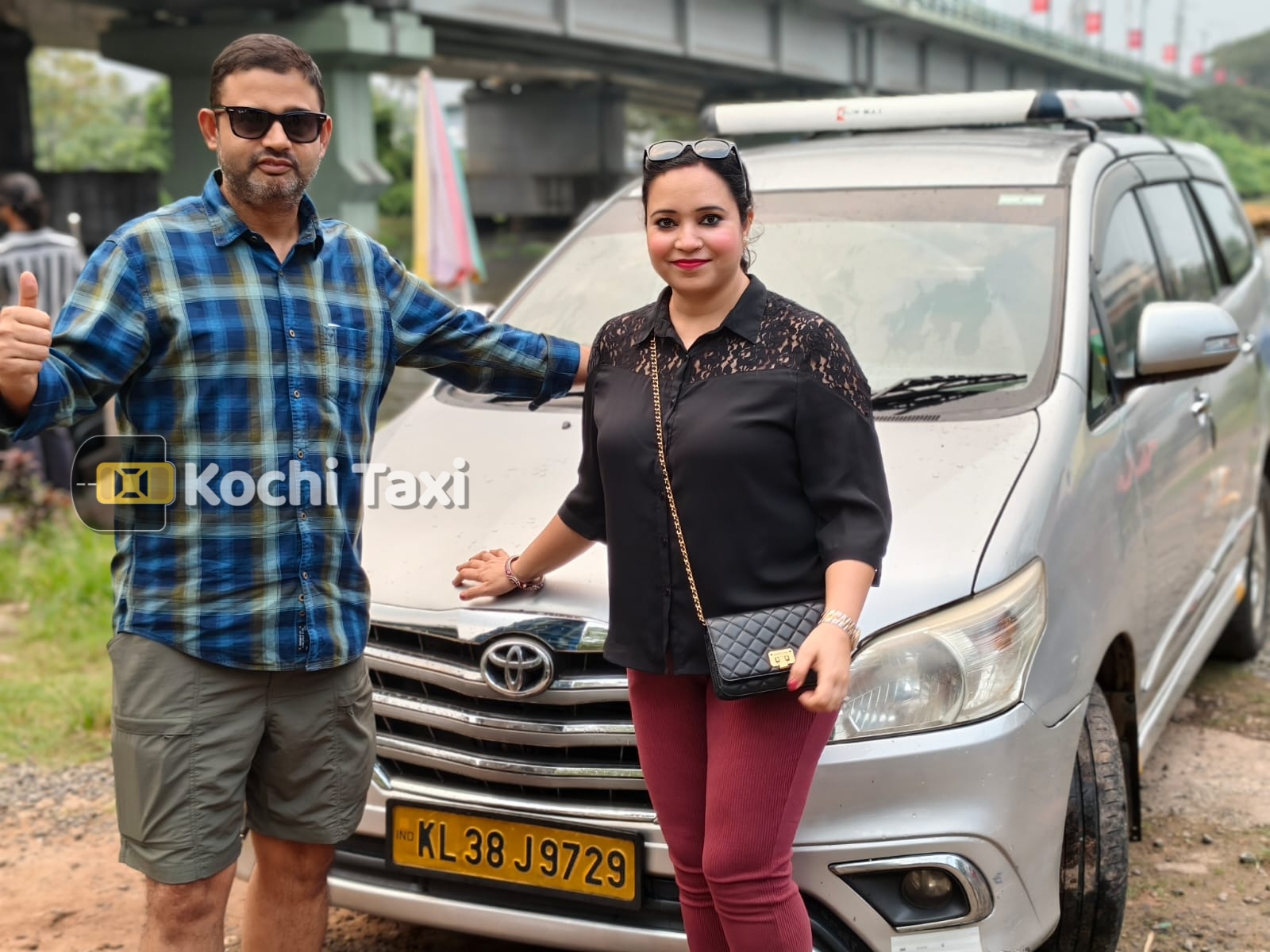 Happy customer with Kochi Taxi vehicle